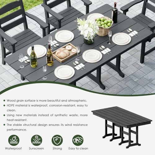 Black outdoor dining set with plates and decor.