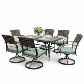 Outdoor patio dining set with six chairs and a table.