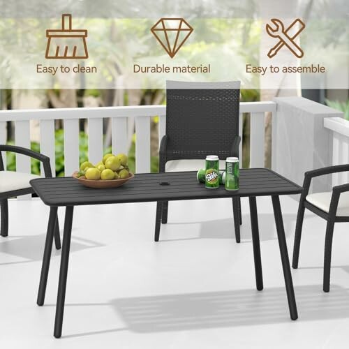 Outdoor patio table set with chairs and drinks.