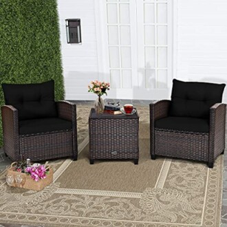 Outdoor patio furniture set with two wicker chairs and table