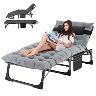 Woman relaxing on a reclining foldable lounge chair with cushion.