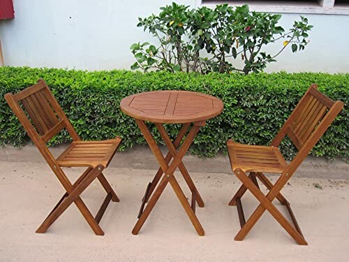 Wooden bistro set with two chairs and a table outdoors.